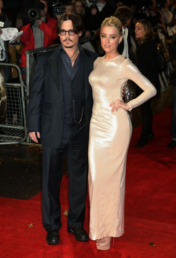 Johnny Depp and Amber Heard arriving for the European Premiere of The Rum Diary, at Odeon Kensington
