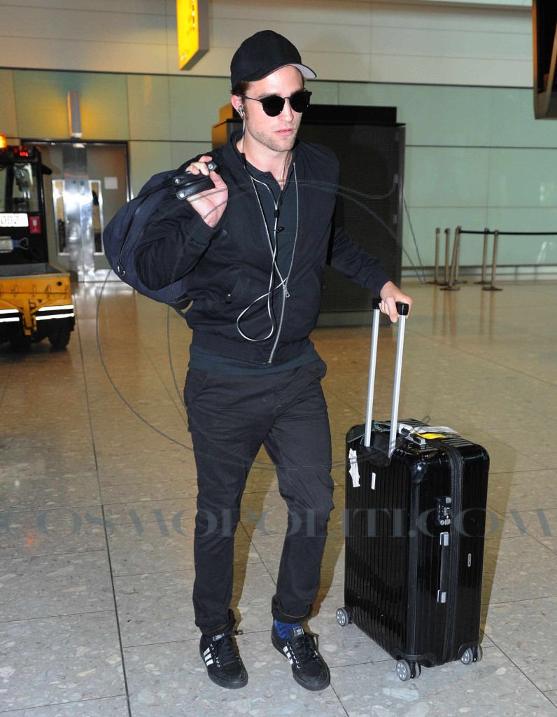 Robert Pattinson Lands In London