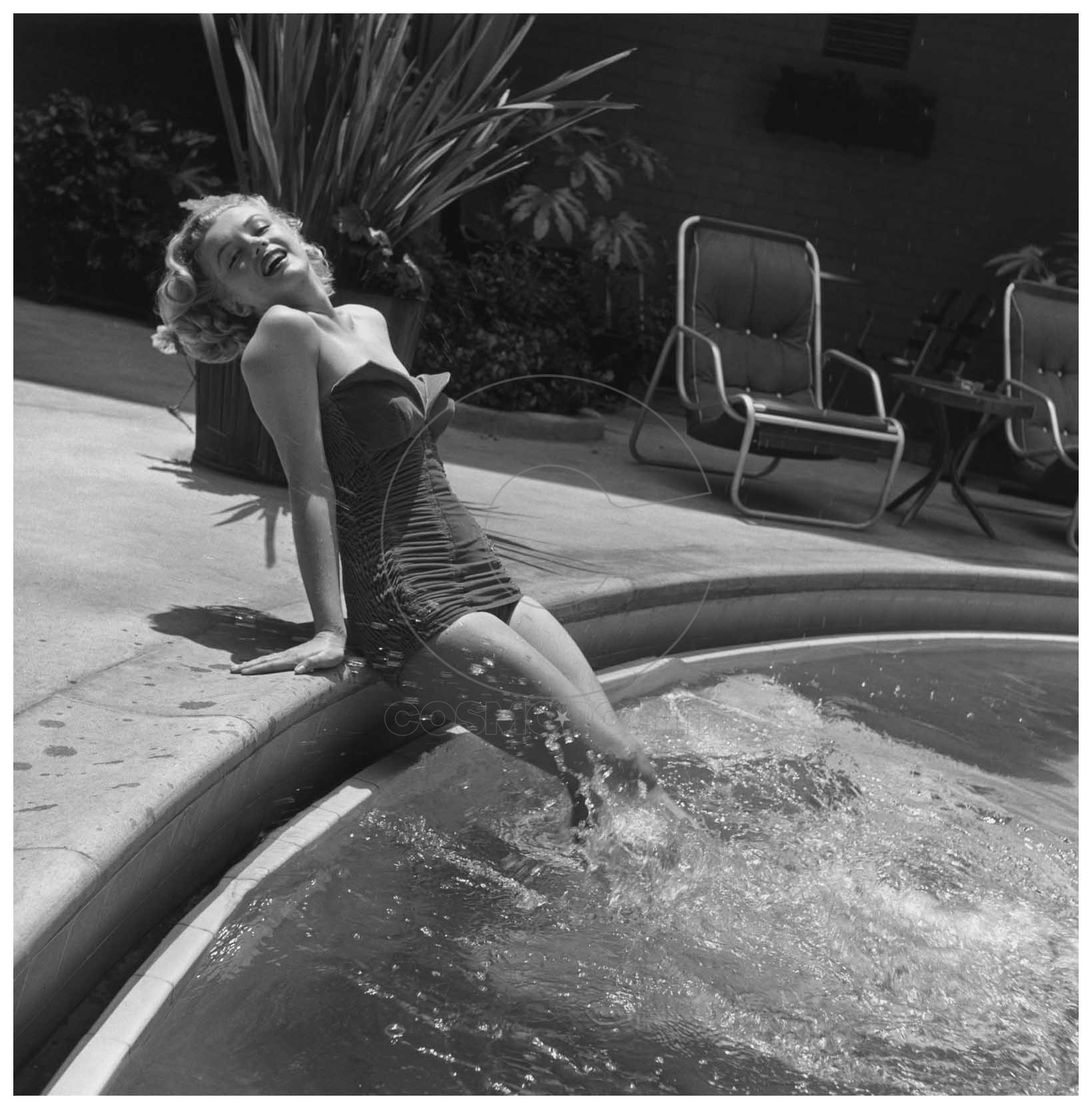 marilyn-monroe-1926-1962-wearing-a-bathing-suit-and-with-her-legs-in-a-swimming-pool-circa-1951-photo-by-archive-photos-getty-images-1951