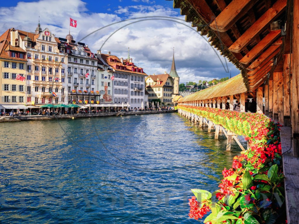 lucerne-switzerland-although-it-may-not-be-as-well-known-as-other-swiss-cities-like-zurich-geneva-or-bern-the-quaint-village-of-lucerne-is-home-to-an-incredibly-well-preserved-covered-wooden-bridge-plenty-of-traditional-