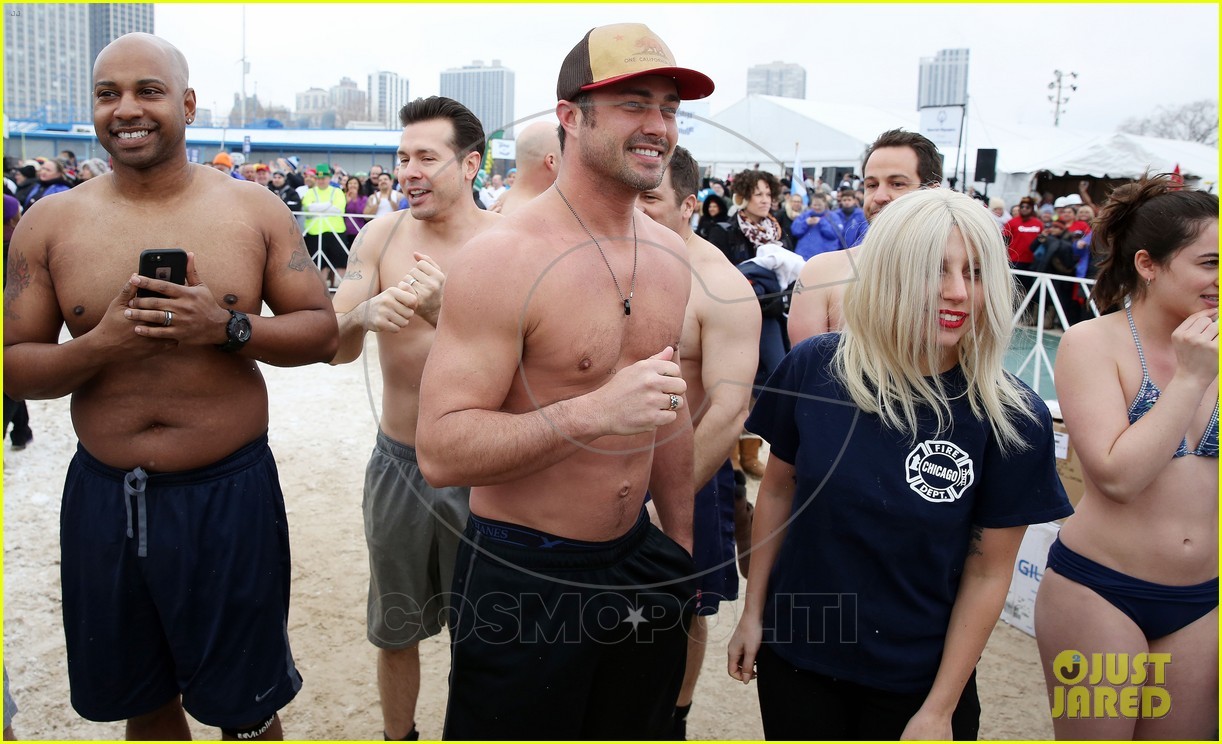 CHICAGO, IL - MARCH 01: Jon Seda, Taylor Kinney and Lady Gaga participates in the Chicago Polar Plunge 2015 at North Avenue Beach on March 1, 2015 in Chicago, Illinois. (Photo by Tasos Katopodis/Getty Images)