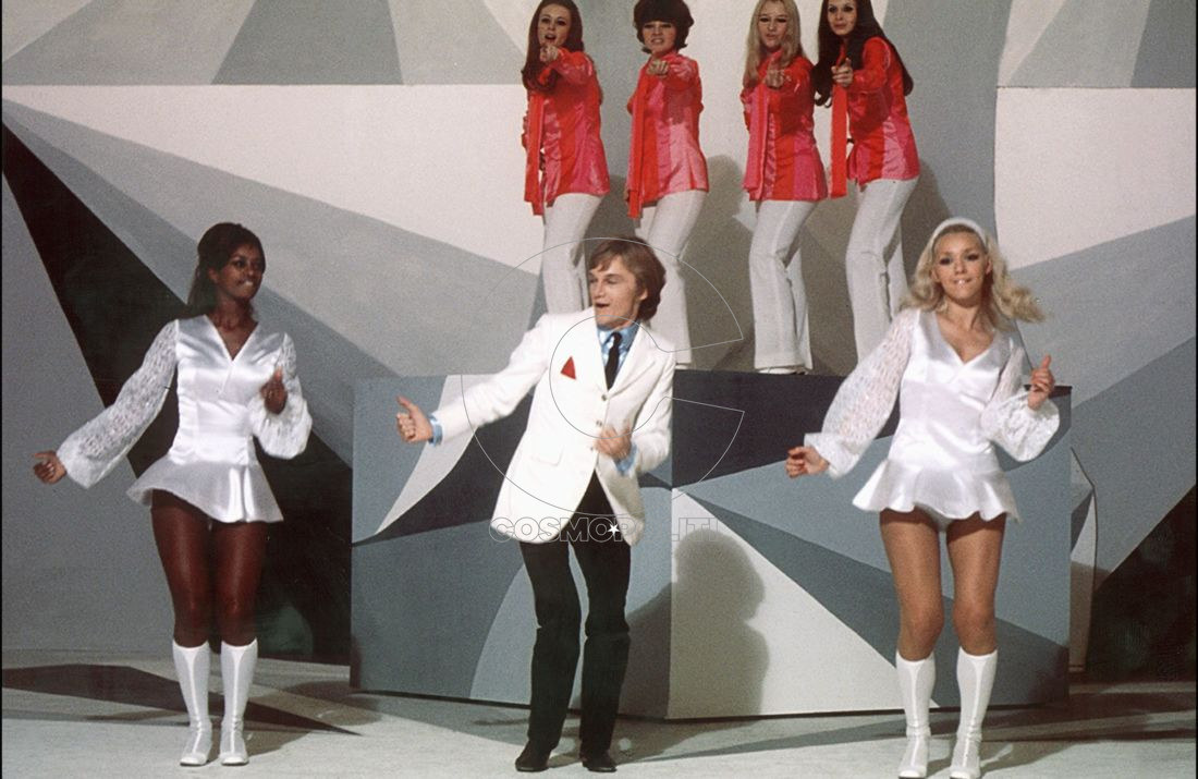 (FILES) In this file photo taken on October 1, 1969 French singer Claude Francois performs with his "Claudettes" dancer on a set of the state own television ORTF in Paris. France will mark the 40th anniversary of French famous 1960/70's singer Claude Francois' death next March 11, 2018. / AFP PHOTO / -