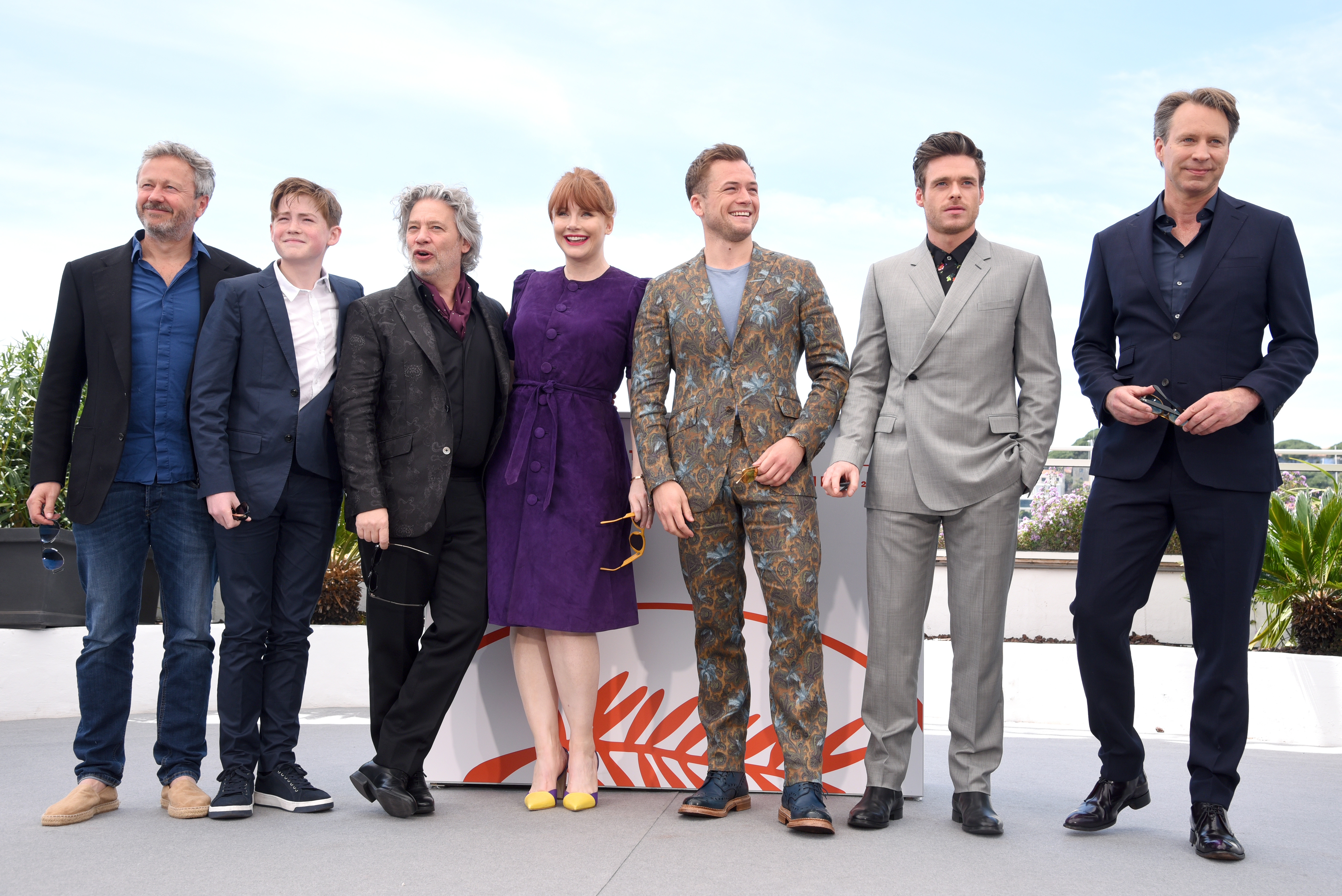 CANNES, FRANCE  - MAY 16:  (L-R) Adam Bohling, Kit Connor, Dexter Fletcher, Bryce Dallas Howard, Taron Egerton, Richard Madden, and Giles Martin attend the "Rocketman" Photocall during the 72nd annual Cannes Film Festival on May 16, 2019 in Cannes, France. (Photo by Serge Arnal/Paramount)