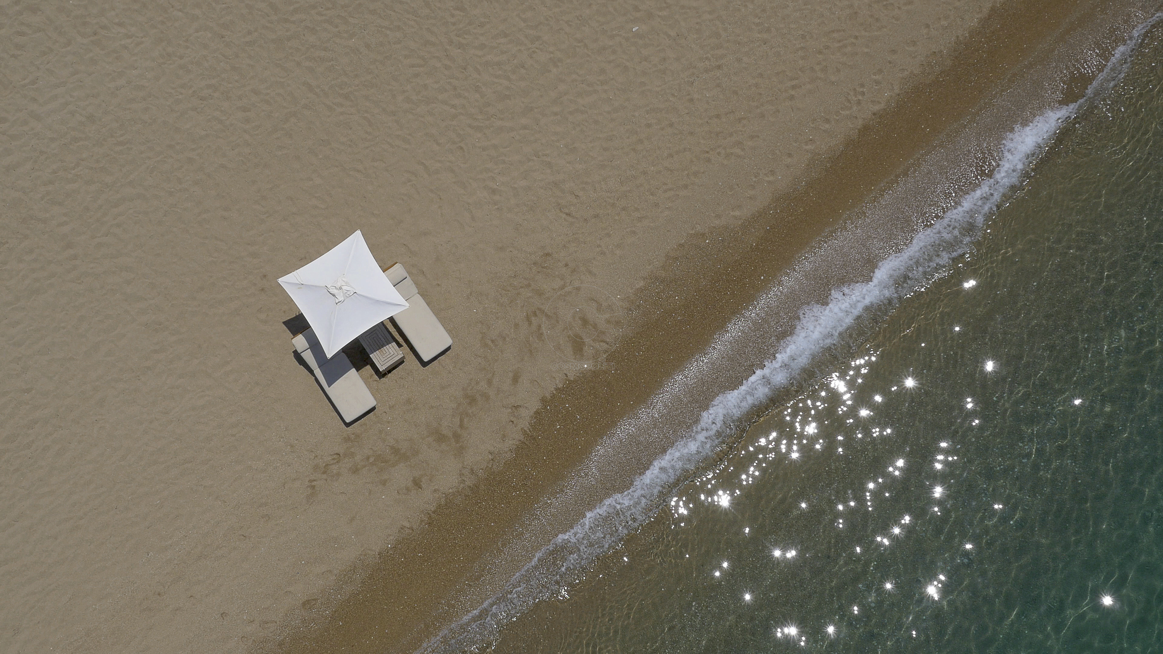 Romanos beach, umbrellas, aerial photo, drone, by Orfeas Kalafatis
